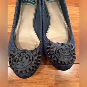 Turquoise ballet flats with satin flower embellishment